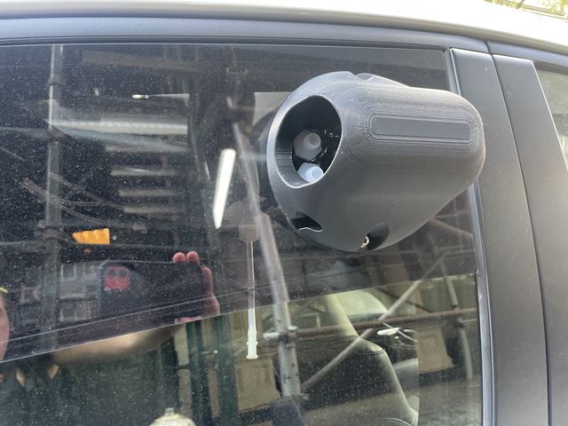 This inlet is on the rear window of the Aclima air monitoring vehicle. Inside, there are clear plastic tubes, which suck in outside air and deliver it to machines in the trunk for analysis.